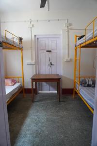 En eller flere senge i et værelse på Cornerbunker