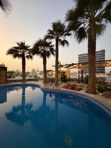 Swimmingpoolen hos eller tæt på Golden Tulip Al Khobar Suites