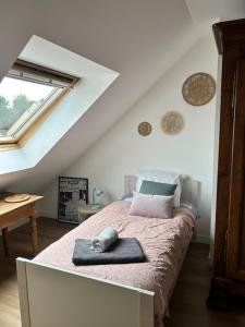 En eller flere senge i et værelse på Entre Doëlan et Le Pouldu