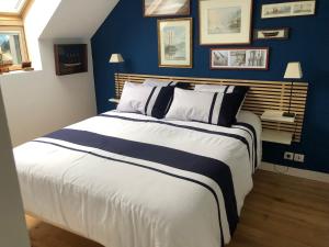 En eller flere senge i et værelse på Entre Doëlan et Le Pouldu