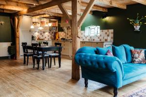 Et opholdsområde på Boutique vakantiehuis Het Stalhuys