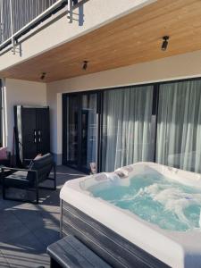 En eller flere senge i et værelse på Kasztanowy Zakątek