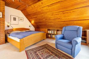 Giường trong phòng chung tại Ferienhaus Hebborn