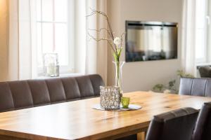 TV a/nebo společenská místnost v ubytování Hotel 'Zum Augarten'