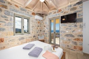 En eller flere senge i et værelse på Villa Dioni Ena + 26 billeder