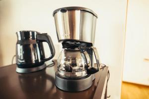 un mixeur posé sur un comptoir dans l'établissement 南町ハウス, à Biei