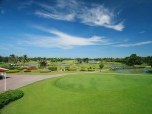 a view of a golf course with a green at Pinehurst Golf Club and Hotel in Ban Bang Khan