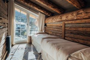 Postel nebo postele na pokoji v ubytování MOUNTAIN LODGE OBERJOCH - Allgäu