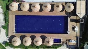 an overhead view of a large swimming pool at Costa Farilya Special Class Hotel Bodrum in Gundogan