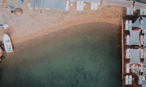 an overhead view of a pool of water next to a building at Costa Farilya Special Class Hotel Bodrum in Gundogan