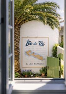 Et logo, certifikat, skilt eller en pris der bliver vist frem på Le Clos des Sternes