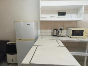 Nhà bếp/bếp nhỏ tại Cozy Flat