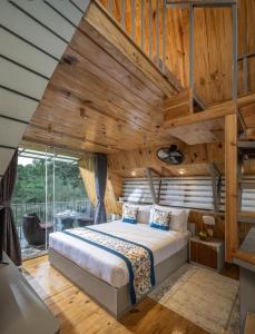 Giường trong phòng chung tại Vanani resort and caravan park Munnar