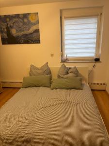 Ένα ή περισσότερα κρεβάτια σε δωμάτιο στο Blick auf Bautzen