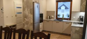 Kuchyň nebo kuchyňský kout v ubytování Letnisko + 58 fotografií