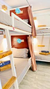a bunk bed room with two bunk beds in it at Romny cozy bay Resort in Koh Rong Sanloem
