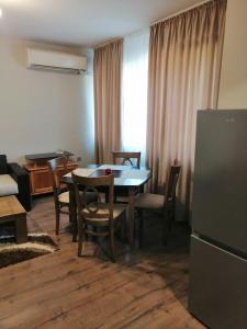 Posezení v ubytování Апартамент Light blue + 16 fotografií