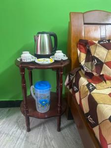 En eller flere senge i et værelse på CR Residency