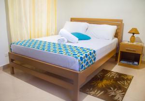 Een bed of bedden in een kamer bij Cabañas Green Yard