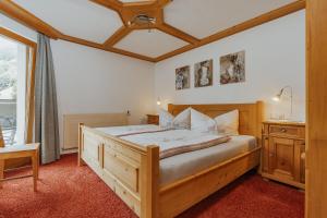 Postel nebo postele na pokoji v ubytování Haus Schwarzhans