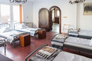 Posteľ alebo postele v izbe v ubytovaní Magic Garden Hostel