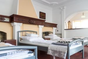 Posteľ alebo postele v izbe v ubytovaní Magic Garden Hostel