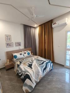 En eller flere senge i et værelse på La Villa K