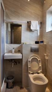 Koupelna v ubytování Nyota Lodge Hôtel