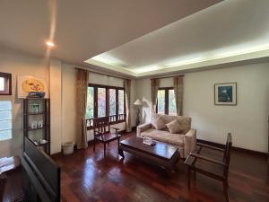 Posezení v ubytování Teak Garden Resort, Chiang Rai