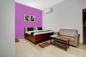 Ένα ή περισσότερα κρεβάτια σε δωμάτιο στο Hotel O by OYO Green Villa