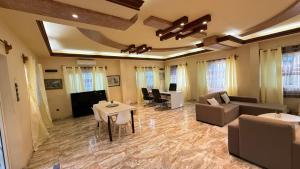 Et opholdsområde på La Maison des Palmiers