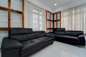 Posezení v ubytování Collection O Kulathoor TechnoparkFormerly United Mansions