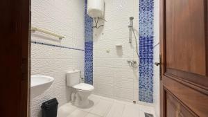 Et badeværelse på La Maison des Palmiers + 12 billeder