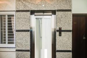 Fotografie z fotogalerie ubytování Hotel O Urban Suits v destinaci Bengalúr