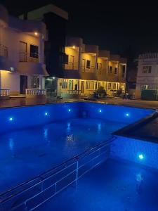 Swimmingpoolen hos eller tæt på Sea Land Mandarmani