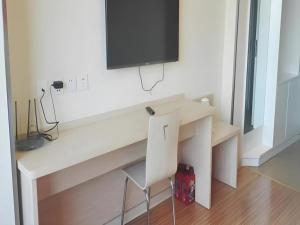 Μια τηλεόραση ή/και κέντρο ψυχαγωγίας στο 7 Days Inn Dongsheng Railway Station