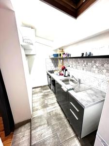 Nhà bếp/bếp nhỏ tại Séjour confort proche de Paris