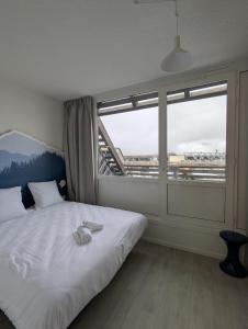 En eller flere senge i et værelse på VVF "Piau-Engaly" Aragnouet -Entièrement rénové