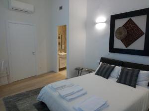 Posteľ alebo postele v izbe v ubytovaní Opera 19 Luxury Apartment