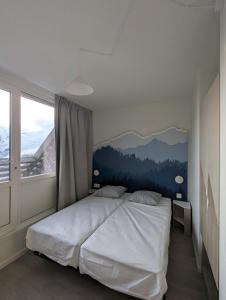 En eller flere senge i et værelse på VVF "Piau-Engaly" Aragnouet -Entièrement rénové + 41 billeder