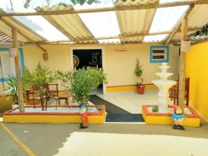 Foto da galeria de Pousada Atobá Juquehy Apartamentos em Juqueí