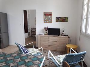 Et tv og/eller underholdning på La Pointe du Bec by TAH - Face mer et accès plage + 13 billeder