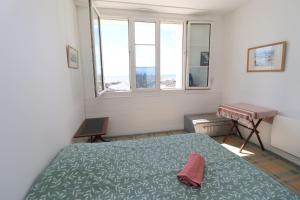 En eller flere senge i et værelse på La Pointe du Bec by TAH - Face mer et accès plage