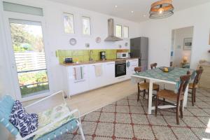 Køkken eller tekøkken på La Pointe du Bec by TAH - Face mer et accès plage