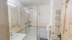 Koupelna v ubytování Edelweiss Lanezzi + 9 fotografií