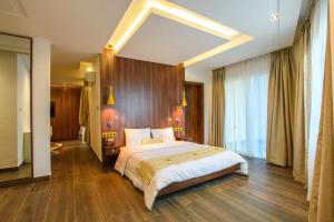 Postel nebo postele na pokoji v ubytování ART Residence + 14 fotografií