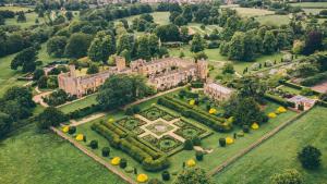 an aerial view of a castle with a garden at Badgerwood in Winchcombe +24 photos