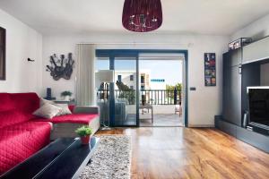 Et opholdsområde på Precioso Piso cerca de la Playa