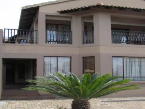 En balkon eller terrasse på The Orion Guesthouse