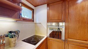 Η κουζίνα ή μικρή κουζίνα στο Apartment Praval +7 φωτογραφίες